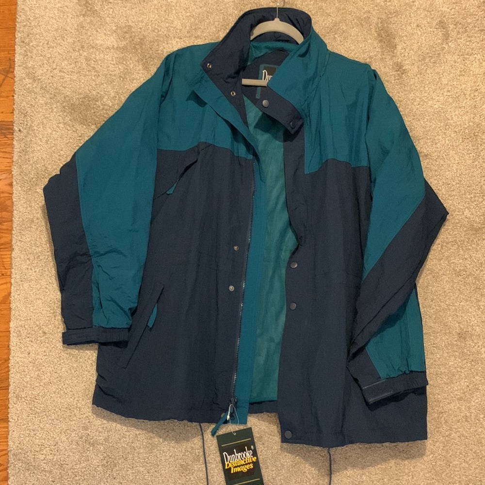Brand new Dunbrooke hooded jacket! Has full zipper front & snap closure.